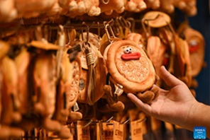 Mbinu za kijadi za kutengeneza mkate wa naan zarithiwa na kuendelezwa Xinjiang, China